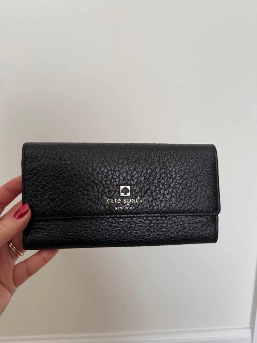 kate spade Black Pebbled Leather Fold-Over Wallet with Gold Logo